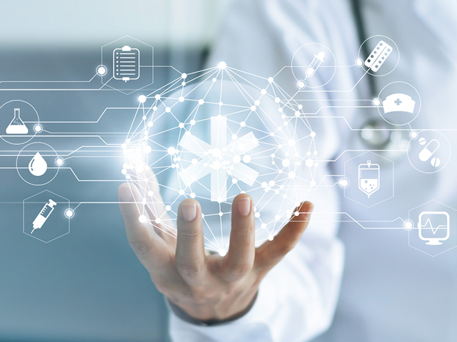 A doctor is holding animated medical icons