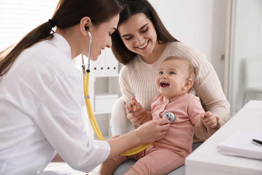mother with her child at pediatric clinic