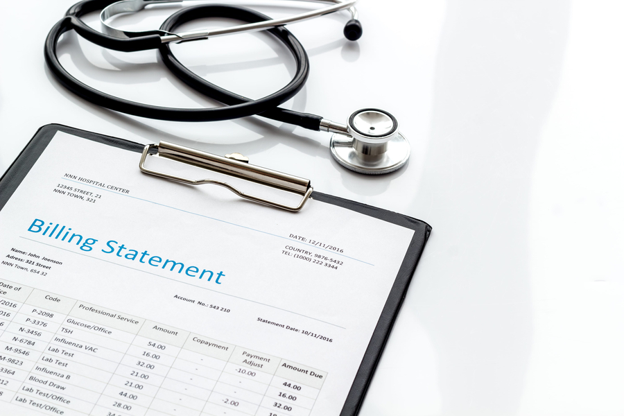 medical billing statement on doctor's desk