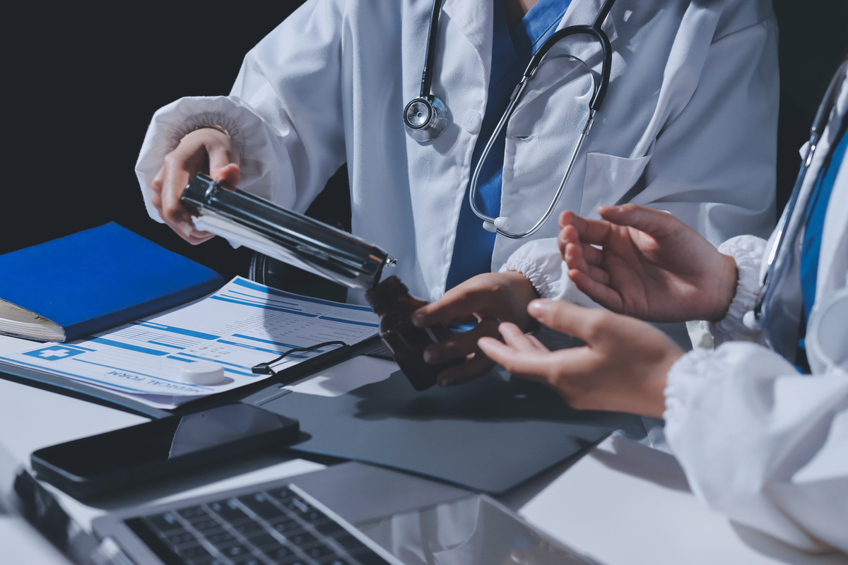 two doctors working on medical billing